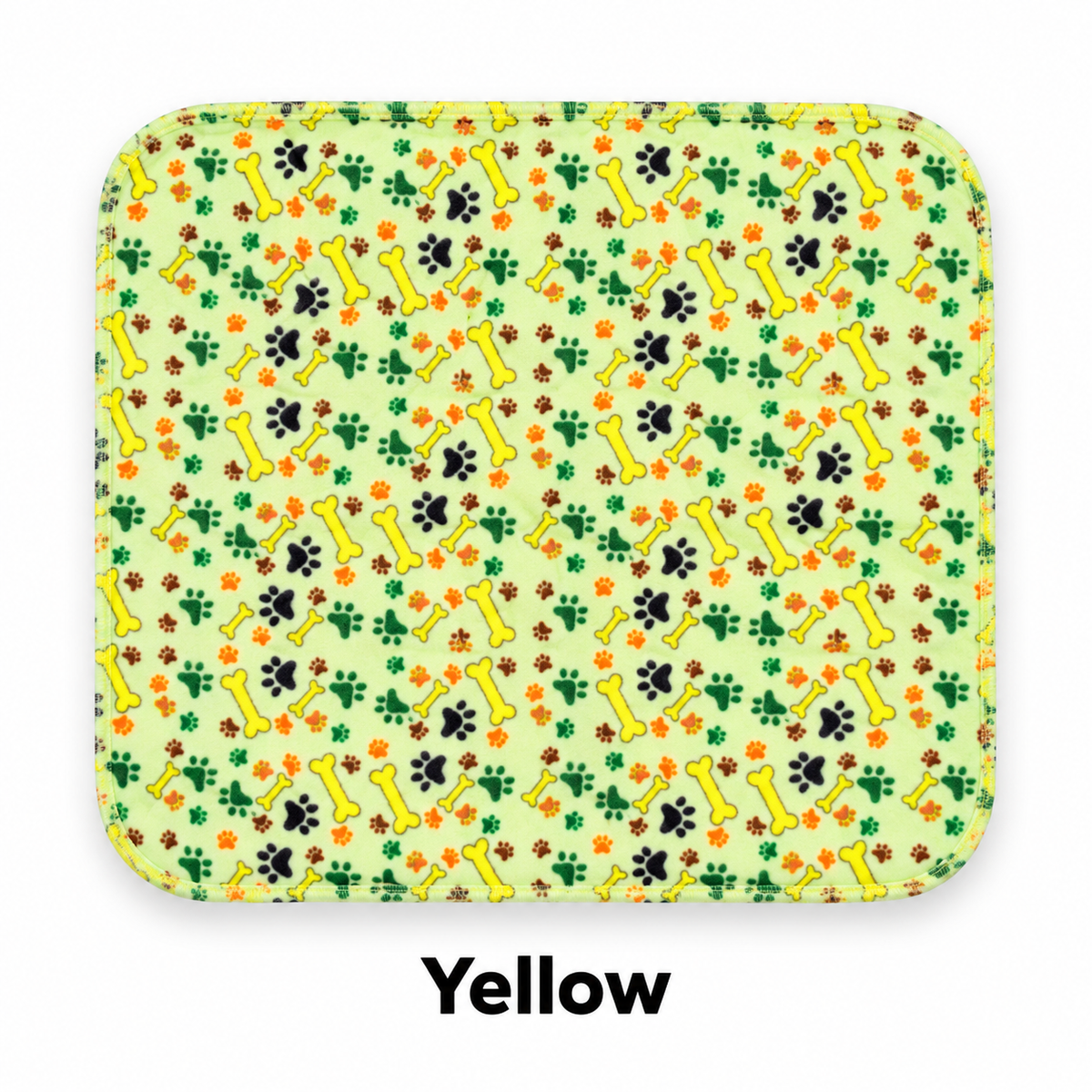 Yellow washable dog pad with paw and bone print
